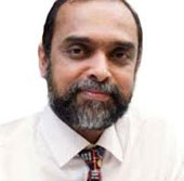 Dr. Ajit Menon