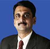 Dr. Tilak Suvarna