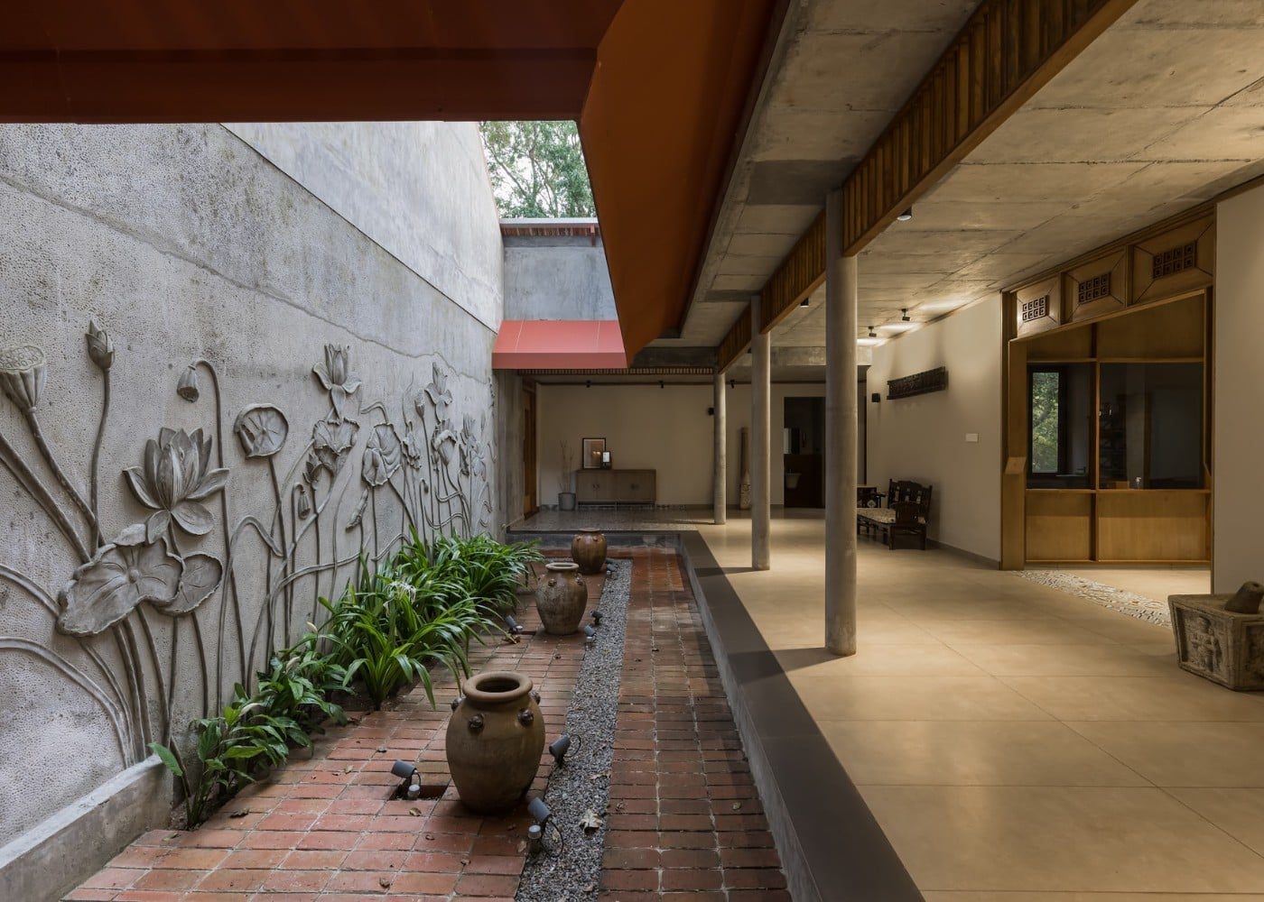 Open Courtyard And Lotus Relief Wall Inside Kairali The Ayurvedic Healing Village