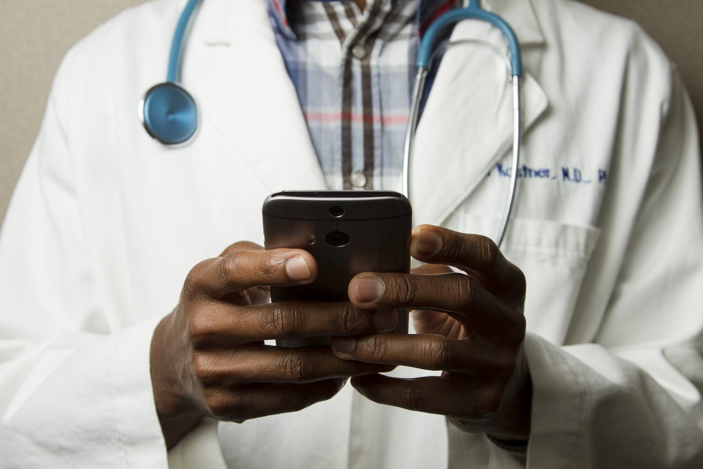 Specialist reviewing patient reports