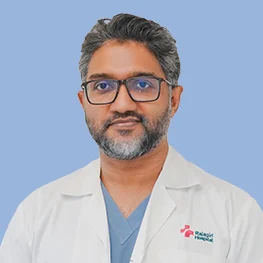 Dr. Tharun B K