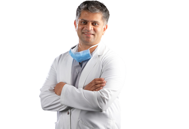 Dr. Dinesh M G