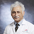 Dr. Shailesh Raina