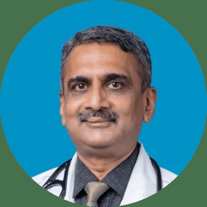 Dr. Tilak Suvarna