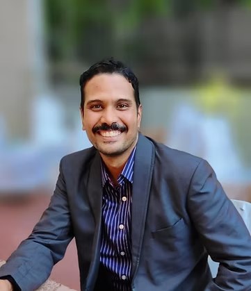 Dr. Harsha K J
